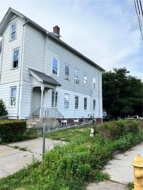 35 Appleton Ave, Pawtucket, RI 02860 - view of front facade featuring a chimney