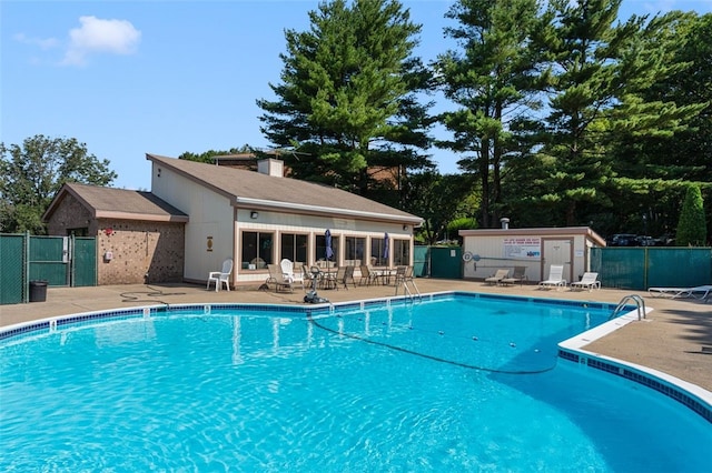 750 Quaker Ln Unit B112, Warwick, RI 02818 - community pool with a patio area
