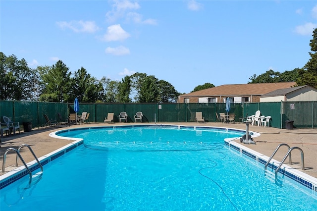 750 Quaker Ln Unit B112, Warwick, RI 02818 - community pool with a patio