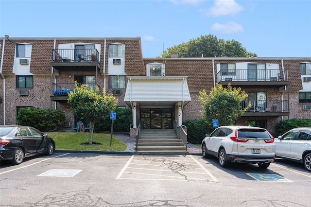 750 Quaker Ln Unit B112, Warwick, RI 02818 - view of property featuring uncovered parking