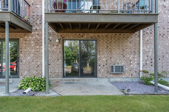 750 Quaker Ln Unit B112, Warwick, RI 02818 - property entrance with a balcony, a patio, and brick siding