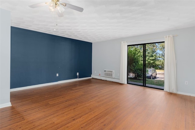 750 Quaker Ln Unit B112, Warwick, RI 02818 - unfurnished room with wood finished floors, ceiling fan, and a wall mounted AC