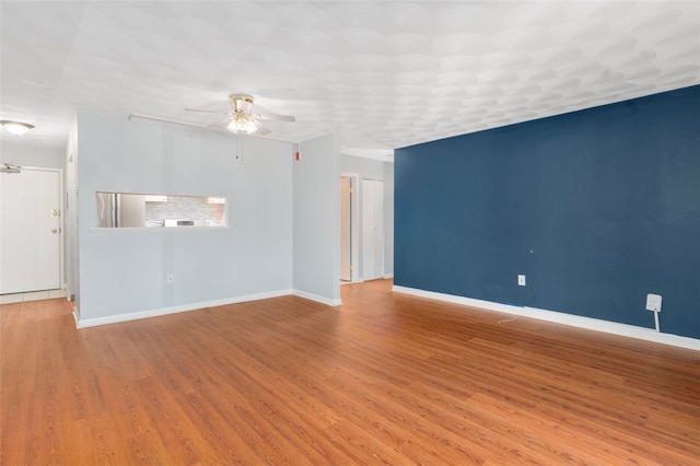 750 Quaker Ln Unit B112, Warwick, RI 02818 - unfurnished room featuring a ceiling fan and wood finished floors