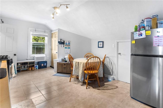 38 Vine St, East Providence, RI 02914 - dining area with lofted ceiling and light tile patterned floors