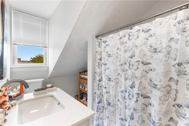 38 Vine St, East Providence, RI 02914 - bathroom featuring vanity, curtained shower, and lofted ceiling