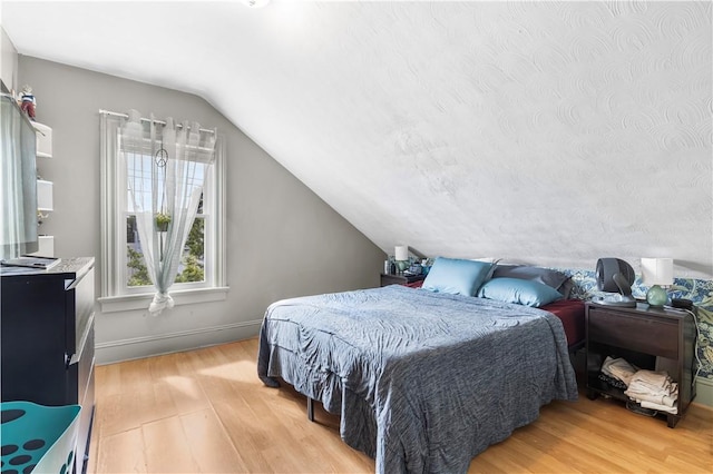 38 Vine St, East Providence, RI 02914 - bedroom featuring light wood-style floors and lofted ceiling