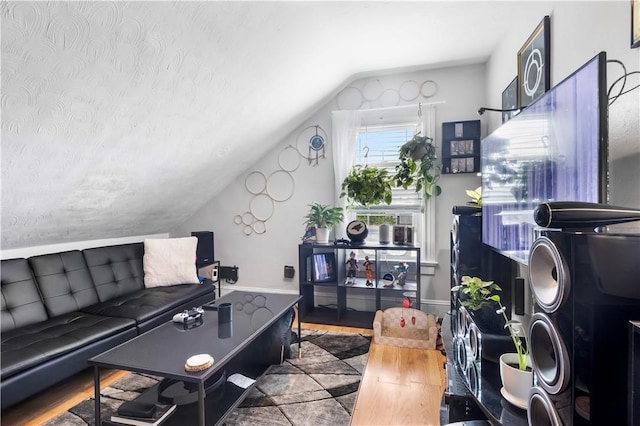 38 Vine St, East Providence, RI 02914 - living area featuring vaulted ceiling and wood finished floors