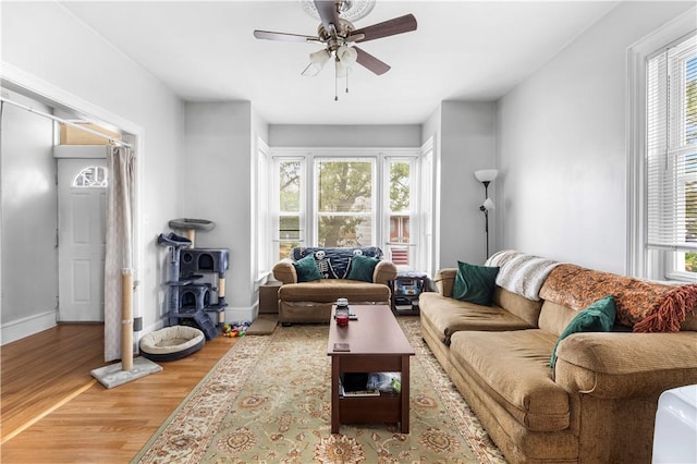38 Vine St, East Providence, RI 02914 - living area featuring light wood-style flooring, healthy amount of natural light, and ceiling fan