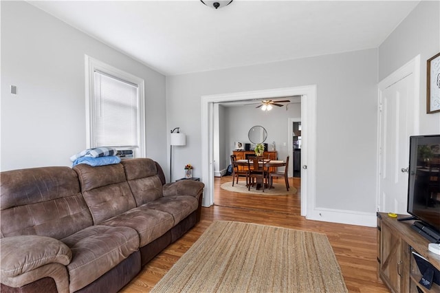 38 Vine St, East Providence, RI 02914 - living area with light wood-style flooring and a ceiling fan