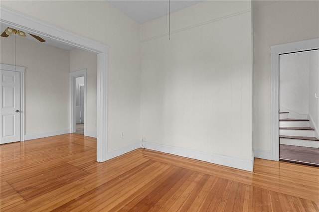 230 Pawtucket Ave, Pawtucket, RI 02860 - spare room with light wood-style floors, a ceiling fan, and stairway