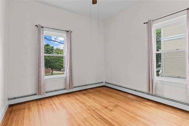 230 Pawtucket Ave, Pawtucket, RI 02860 - spare room featuring healthy amount of natural light, baseboard heating, and light wood-style floors