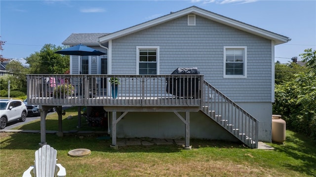 21 Overlook Ave, Charlestown, RI 02813 - back of property featuring a wooden deck, a yard, and stairs