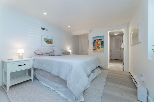 21 Overlook Ave, Charlestown, RI 02813 - bedroom featuring a baseboard radiator, recessed lighting, and light wood-type flooring