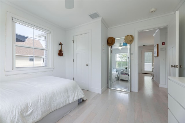 21 Overlook Ave, Charlestown, RI 02813 - bedroom with crown molding, light wood finished floors, and a ceiling fan