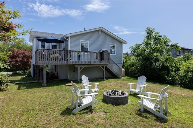 21 Overlook Ave, Charlestown, RI 02813 - rear view of property with a fire pit, stairway, a deck, and a lawn