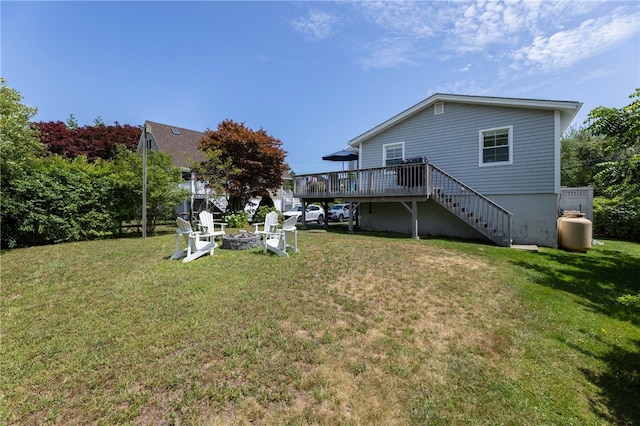 21 Overlook Ave, Charlestown, RI 02813 - rear view of property with a fire pit, a deck, stairs, and a yard
