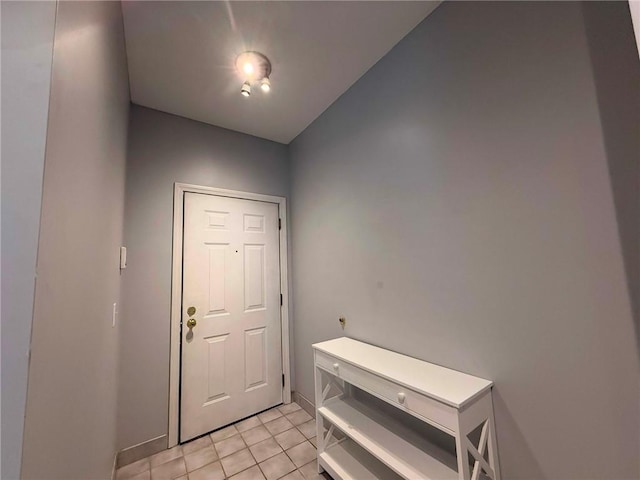 106 Mill St Unit 102, Woonsocket, RI 02895 - entrance foyer featuring light tile patterned floors and baseboards