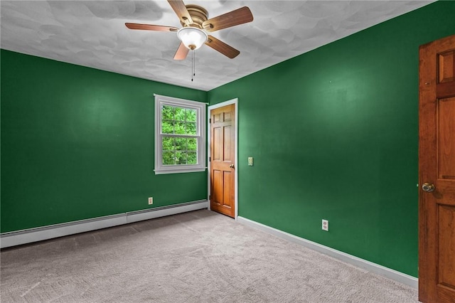 43 Peckham Pl, Bristol, RI 02809 - spare room with baseboard heating, carpet, and a ceiling fan