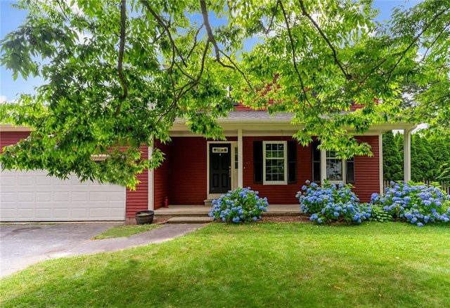 43 Peckham Pl, Bristol, RI 02809 - view of front facade featuring a porch, asphalt driveway, a garage, and a front lawn