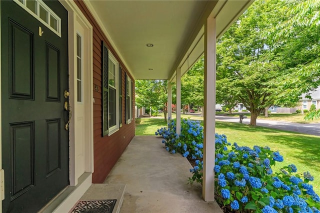 43 Peckham Pl, Bristol, RI 02809 - porch featuring a yard