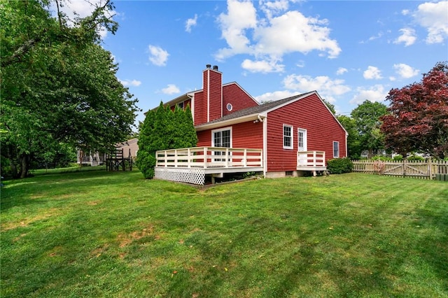 43 Peckham Pl, Bristol, RI 02809 - back of house featuring a deck and a chimney