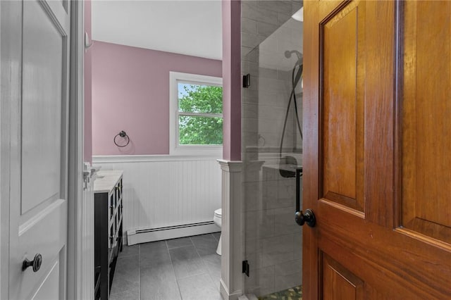 43 Peckham Pl, Bristol, RI 02809 - full bathroom featuring baseboard heating, wainscoting, a stall shower, vanity, and tile patterned flooring