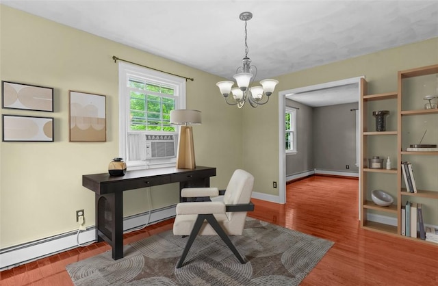 43 Peckham Pl, Bristol, RI 02809 - office area with cooling unit, a chandelier, baseboard heating, wood finished floors, and a baseboard heating unit