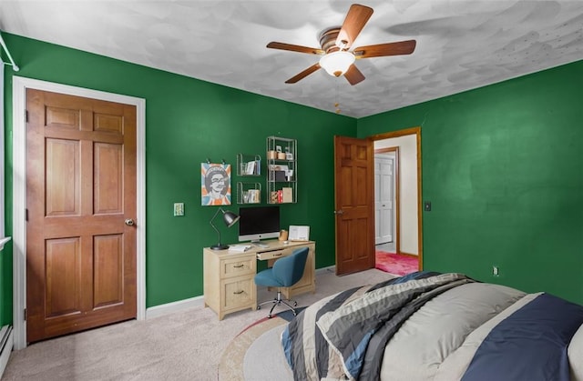 43 Peckham Pl, Bristol, RI 02809 - carpeted bedroom with a desk and ceiling fan