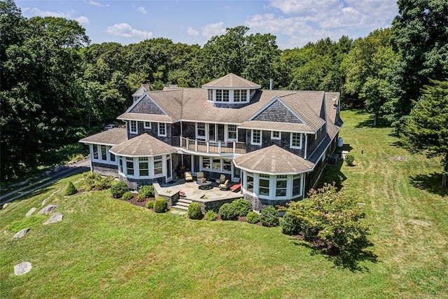 25 Brayton Point Rd, Westport, MA 02790 - rear view of property with a balcony, a sunroom, a patio, a lawn, and outdoor lounge area