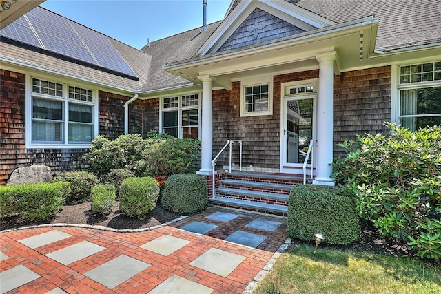 25 Brayton Point Rd, Westport, MA 02790 - entrance to property featuring solar panels and roof with shingles