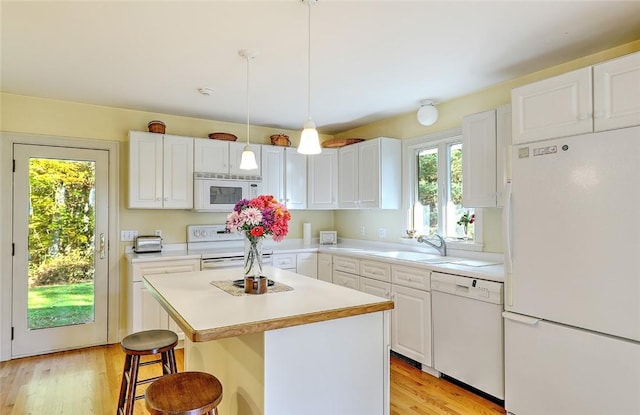 25 Brayton Point Rd, Westport, MA 02790 - kitchen featuring white appliances, white cabinets, and light countertops