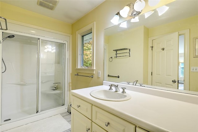 25 Brayton Point Rd, Westport, MA 02790 - full bath featuring a shower stall, vanity, and a chandelier