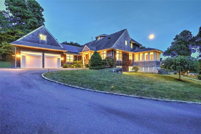 25 Brayton Point Rd, Westport, MA 02790 - view of front of property with a front lawn, an attached garage, and driveway