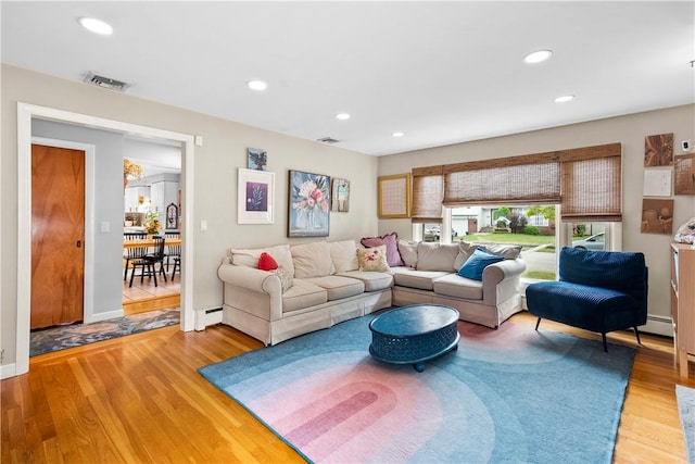 17 Golini Dr, Johnston, RI 02919 - living room with light wood finished floors, recessed lighting, and baseboard heating