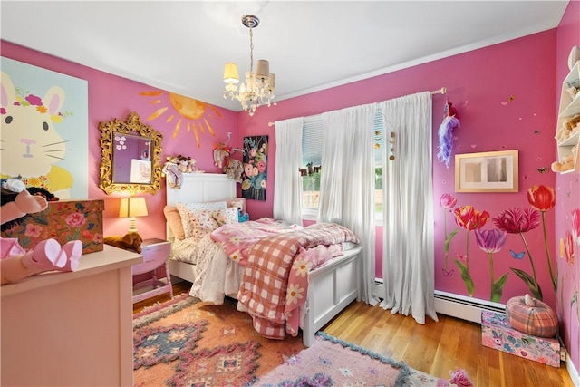 17 Golini Dr, Johnston, RI 02919 - bedroom featuring a chandelier, wood finished floors, a baseboard radiator, and a baseboard heating unit