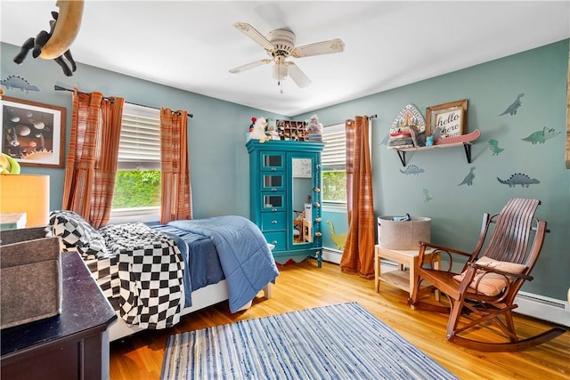 17 Golini Dr, Johnston, RI 02919 - bedroom with multiple windows, light wood-type flooring, and ceiling fan