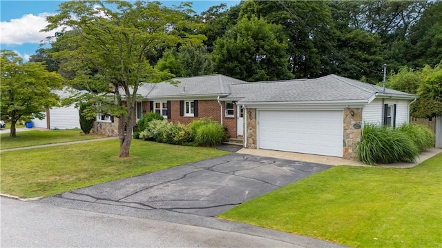 17 Golini Dr, Johnston, RI 02919 - ranch-style home featuring driveway, stone siding, a front yard, a garage, and roof with shingles