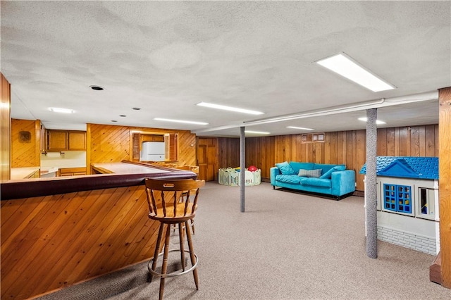 17 Golini Dr, Johnston, RI 02919 - rec room featuring wooden walls, wet bar, carpet floors, and a textured ceiling