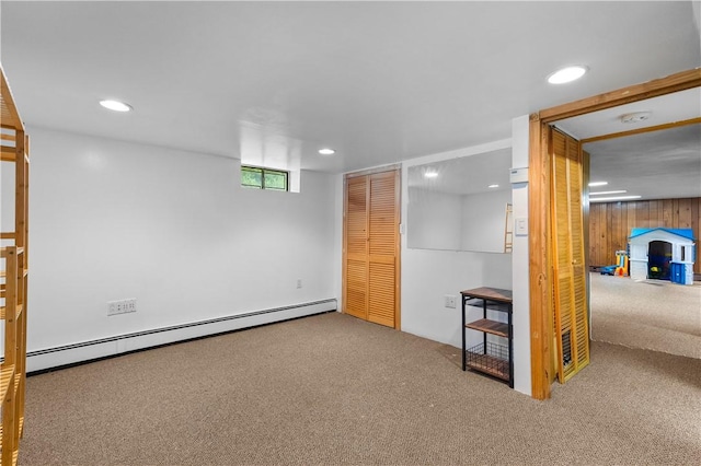 17 Golini Dr, Johnston, RI 02919 - basement featuring a baseboard heating unit, carpet flooring, and recessed lighting