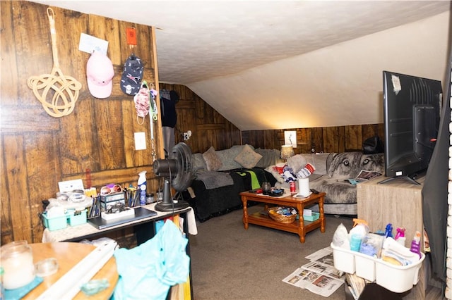 89 Warren Ave, East Providence, RI 02914 - carpeted living room with wood walls, lofted ceiling, and a textured ceiling