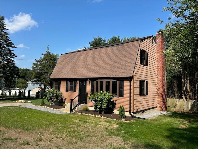 80 Silverwood Ln, West Warwick, RI 02893 - view of front facade with a chimney, roof with shingles, and a gambrel roof