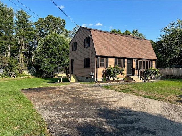 80 Silverwood Ln, West Warwick, RI 02893 - dutch colonial featuring a gambrel roof, a shingled roof, and a wooden deck