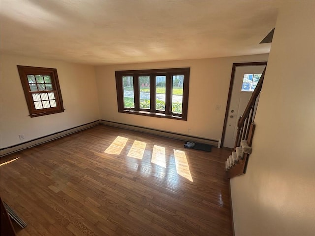 80 Silverwood Ln, West Warwick, RI 02893 - empty room featuring plenty of natural light, wood finished floors, and stairs