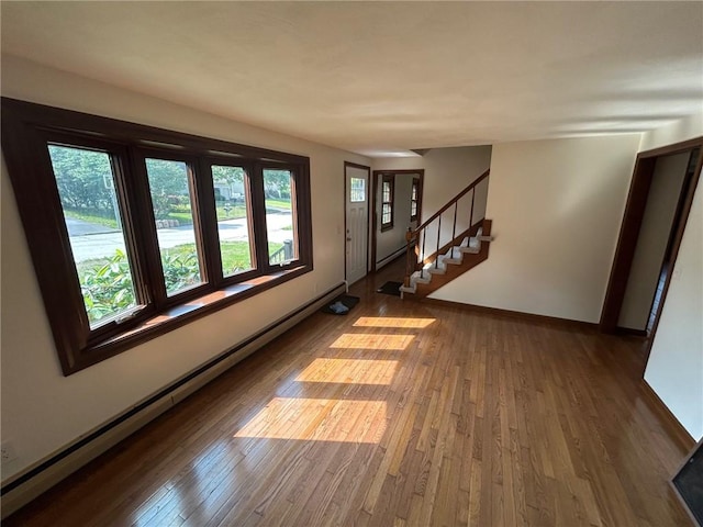 80 Silverwood Ln, West Warwick, RI 02893 - entryway with a baseboard radiator, hardwood / wood-style flooring, and stairs