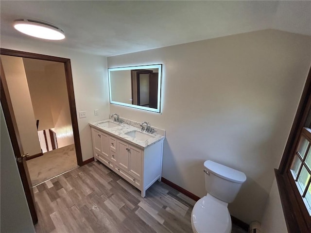 80 Silverwood Ln, West Warwick, RI 02893 - bathroom with wood finished floors and double vanity