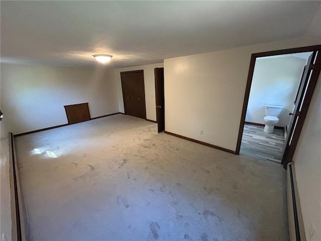 80 Silverwood Ln, West Warwick, RI 02893 - empty room featuring baseboard heating and light carpet