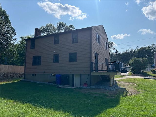 80 Silverwood Ln, West Warwick, RI 02893 - rear view of house featuring a chimney and a deck