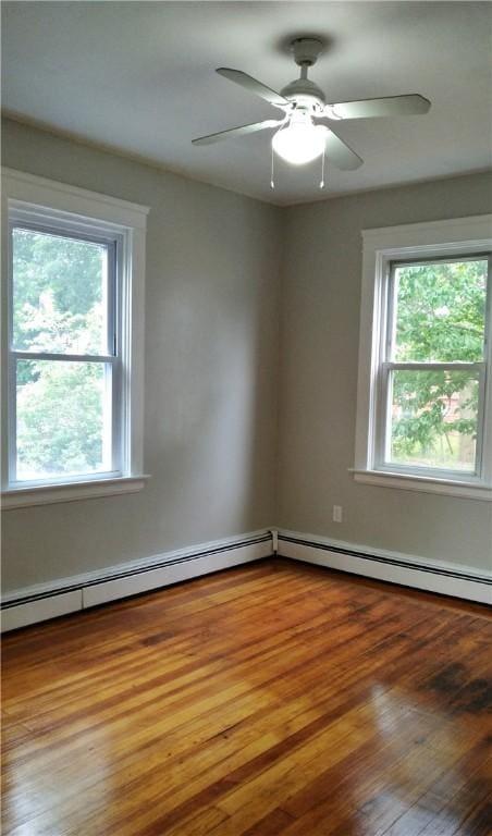 598 Admiral St, Providence, RI 02908 - spare room with hardwood / wood-style flooring, a baseboard radiator, and ceiling fan