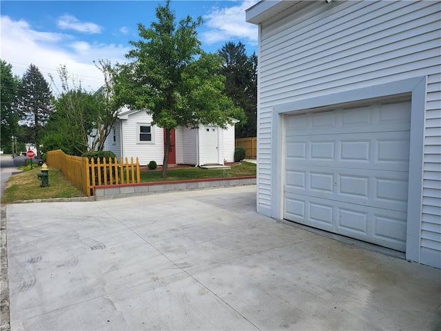 57 Merino St, Johnston, RI 02919 - garage featuring driveway
