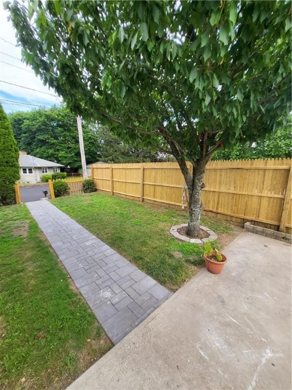 57 Merino St, Johnston, RI 02919 - fenced backyard featuring a patio